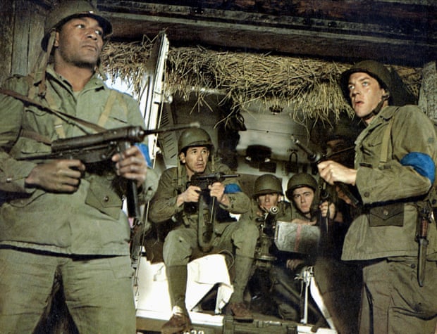 Jim Brown, left, and Donald Sutherland, far right, in The Dirty Dozen, 1967. Brown left the Cleveland Browns during the making of the film. Photograph: MGM/Allstar