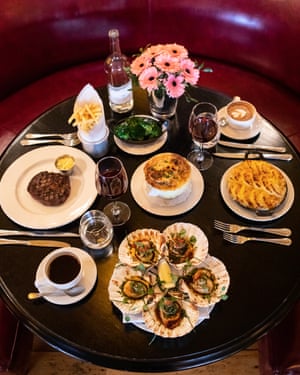 Onion soup gratinée, £9; fish pie, £19.50; broccoli £5; americano £3, baked scallops, £24; steak frites, £27.50; flat white, £3, Carafe of Cotes du Rhone, £21; bottle of sparkling water, £4
