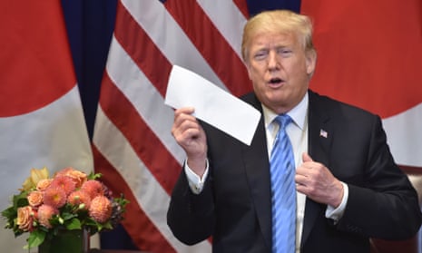 Donald Trump displays a letter he said he received the previous day from the North Korean leader Kim Jong-un, on the sidelines of the United Nations general assembly in New York in 2018.