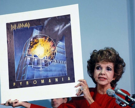 Senator Paula Hawkins holds up the cover of Def Leppard’s album Pyromania at a 1985 Senate hearing.