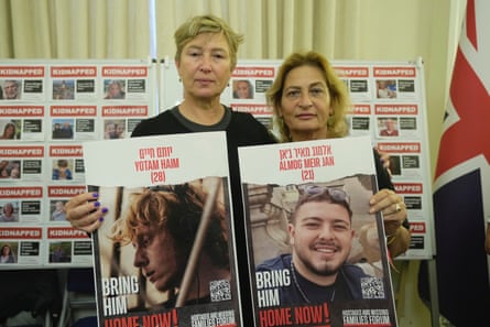 Iris Haim, left, mother of hostage Yotam Haim, and Orit Meir, mother of hostage Almog Meir, both taken after the Oct. 7 assault by Hamas militants, attend a news conference at the Israel Embassy in London.