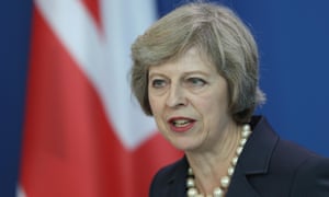 theresa may visits angela merkel in