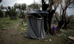 A homemade shower next to the Moria camp.