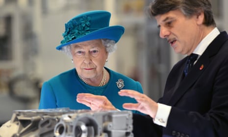 Ralf Speth with the Queen during a royal tour of the Jaguar Land Rover engine manufacturing centre in Wolverhampton in 2014