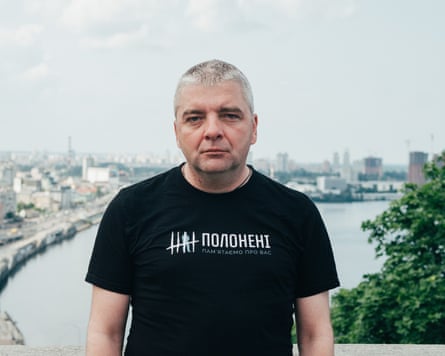Maksym Butkevych on a bridge overlooking Kyiv