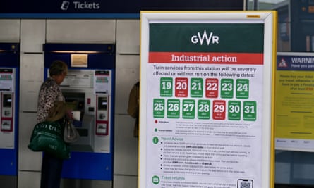 A board beside a ticket machine, detailing the rail strikes in July