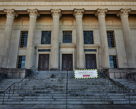 The Orleans Parish Criminal District Court, with tall columns and a "temporarily closed" sign.