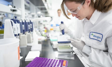 A scientist works in a laboratory at Biogen’s headquarters in Cambridge, Massachusetts