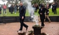 Victoria police chief commissioner Shane Patton participates in a smoking ceremony during the apology to the stolen generations