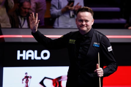 Shaun Murphy celebrates after he battled back from 15-13 behind to beat John Higgins 17-15.