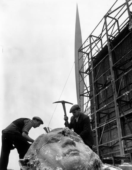 Workmen breaking up a Festival of Britain site on the South Bank.