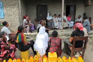 A self-help savings and loans group has been set up by women in Hawassa, southern Ethiopia, Cooking oil is bought in bulk so that members can purchase it at a cheaper rate. Women conduct the business of the meeting, including keeping account of savings into, and loans made from, the group. Their jerry cans will be filled with oil