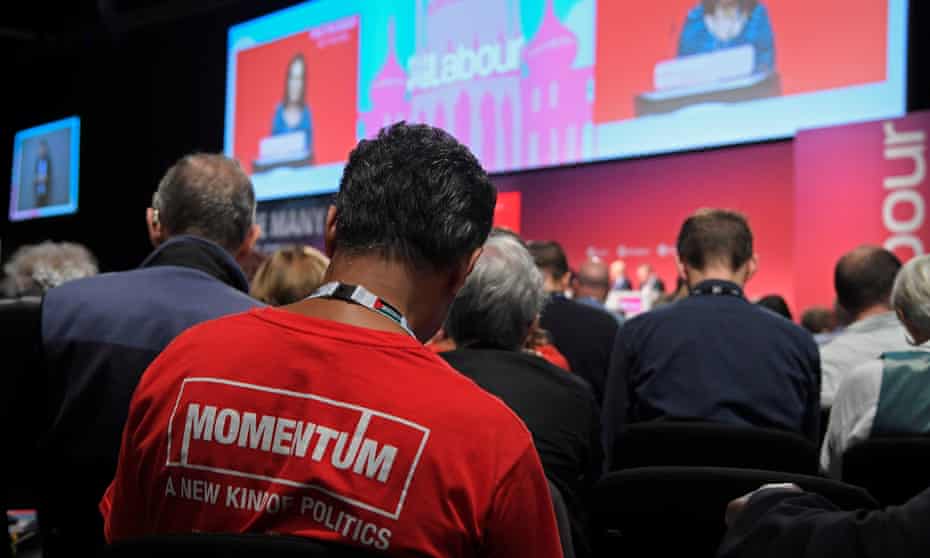 A member of the audience wearing a Momentum T-shirt at the Labour party conference in Brighton on 26 September 2017.