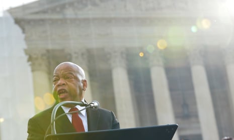 Representative John Lewis speaks during a press conference in front of the US Supreme Court on Capitol Hill in 2013.