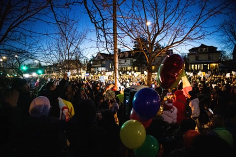 People gather for a vigil and protest for Renee Nicole Good near the intersection of East 34th Street and Portland Avenue in Minneapolis, Minnesota, on January 7, 2026.