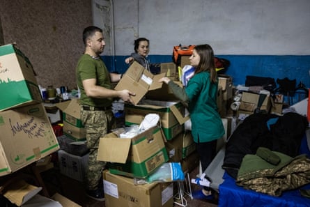Anaesthetist Valeria (right) sorts out supplies at a medical stabilisation centre in a village close to the frontline in southern Donbas.
