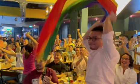 File photo of people reacting in Singapore to plans to  decriminalise gay sex.