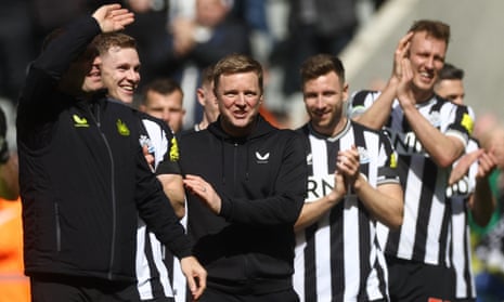 Newcastle United manager Eddie Howe and his players are all smiles as they applaud the fans after the match.