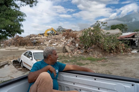 Adolfo Guedez takes a last look at the collapsed building where his daughter spent 18 days trapped after the double earthquake In La Guaira