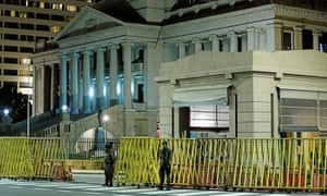 Sri Lankan soldiers stand guard in front of the presidential secretariat in Colombo. 3500.jpg?width=300&quality=85&auto=forma