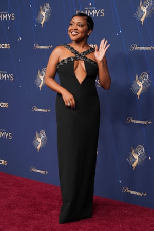 Lead actress in a comedy nominee Quinta Brunson (Abbott Elementary) paired her baby curl hairstyle with a crisscross Louis Vuitton gown