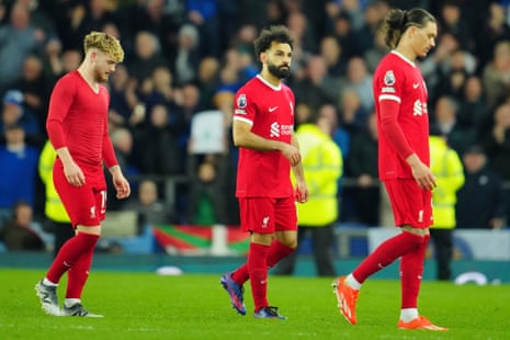 Harvey Elliott, Mohamed Salah and Darwin Nunez cut dejected figures as they leave the pitch after their defeat to Everton.