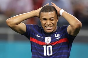France’s forward Kylian Mbappe reacts after a missed chance.