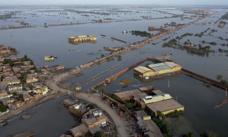 Homes surrounded by flood waters in Sohbat Pur city, a district of Pakistan’s south-western Baluchistan province