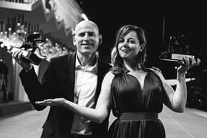 Laure Calamy and Eric Gravel pose with their Orizzonti awards for best actress and best director for A Plein Temps