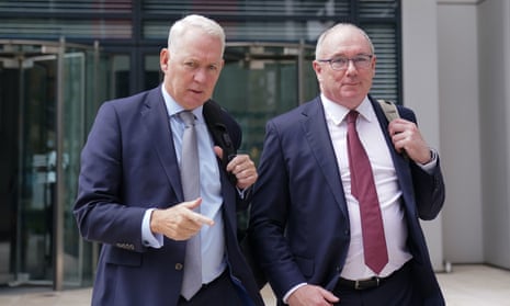 TSB boss Robin Bulloch (left) and UK Finance chief David Postings leave the offices of the Financial Conduct Authority after the meeting