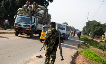 A member of Burundi’s military on patrol as police seek weapons in Bujumbura.