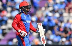 Afghanistan’s captain Gulbadin Naib walks back to the pavilion after his dismissal.