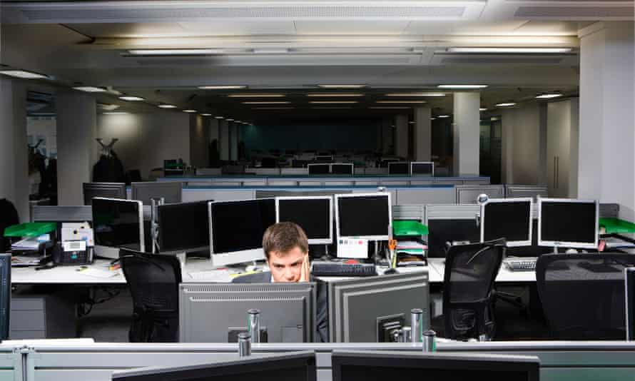 A business man working late<br>Knight Frank, Baker Street, London, UK