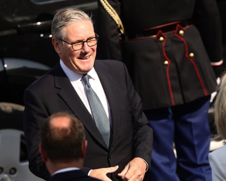 Britain's outgoing prime minister Keir Starmer arrives for the Bastille Day military parade, in Paris, France.