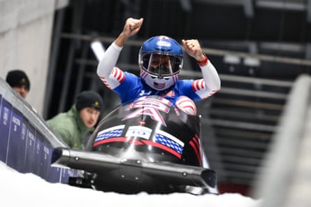 Elana Meyers Taylor crosses the line in her bobsleigh.