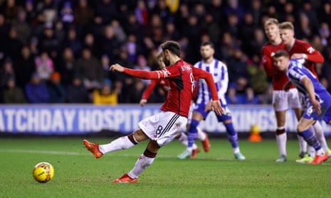 Manchester United’s Bruno Fernandes scores their second goal from the penalty spot.