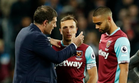 Slaven Bilic tries to get his message across to Mark Noble and Winston Reid