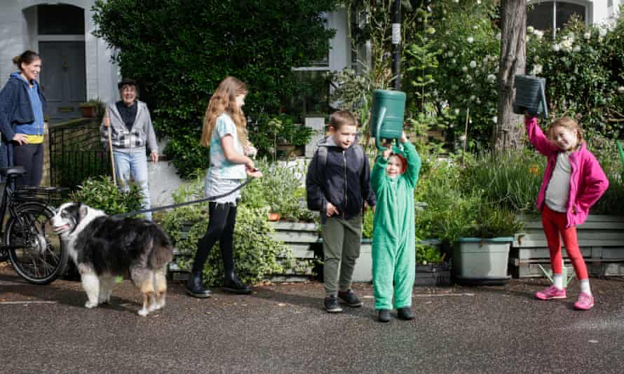 Me and My Parklet story: Dr Lynne Friedli, Islington, Mayton Street, London from left to right: Helena Farstad, Lynne Friedli, Hennie Farstad McKeown, Roy Hanson, Jesse Hanson, Ebba Farstad McKeown – plus dog Barnie The local children help out with gardening on their way to school in the mornings [Helena Farstad and Nell Loder, who can give permission as parents for Hennie, Roy, Jesse and Ebba.]