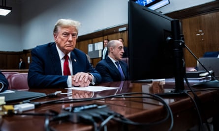 Former President Donald Trump sits in the courtroom on the first day of his criminal trial in New York.
