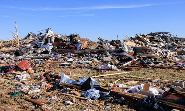 Debris are piled after a tornado tore through rural Kentucky us,Kentucky tornadoes,Joe Biden,disaster in Kentucky ,harbouchanews