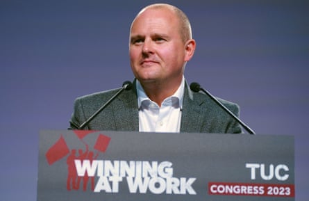 Paul Nowak speaking at a TUC-branded lectern