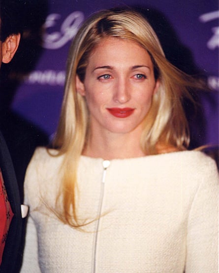 Portrait of Carolyn Bessette in white jacket