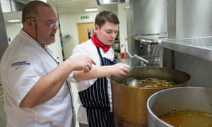 A catering and hospitality student being tutored at Croydon college