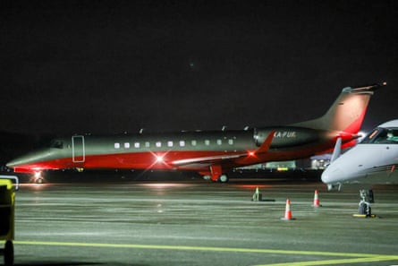 Plane on a runway at night