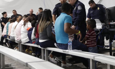 Migrants who are applying for asylum go through the processing area in Laredo, Texas, in September.