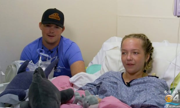 Rhett Willingham, left, and Addison Bethea, right, discuss a 30 June shark attack which Addison survived, but not without needing her right leg partially amputated.