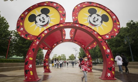 Tourists at Disneytown in Shanghai, China, on 5 May. 