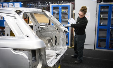 A worker at the Jaguar Land Rover factory in Solihull, West Midlands