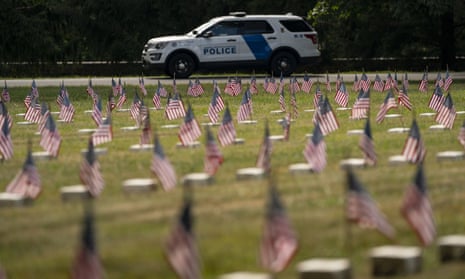 A police vehicle patrols the Gettysburg National Cemetery.
