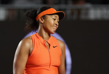 Naomi Osaka looks disappointed during her defeat